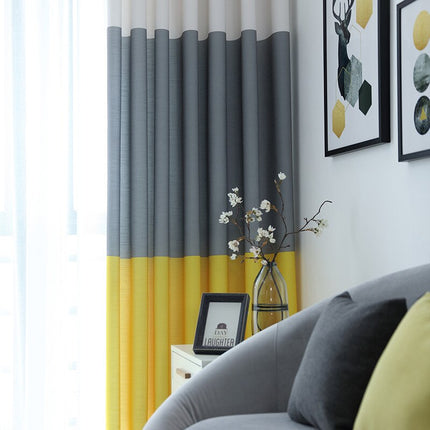 Farveblok gardin i grå og gul