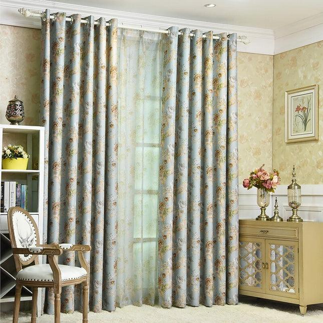 Mørklægningsgardin med romantisk blomstermotiv