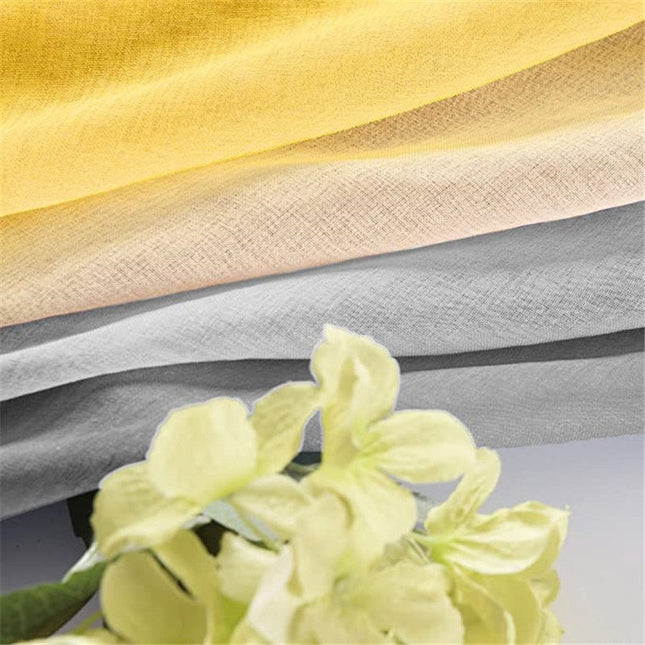 Let gardin med gul-grå farvegradient