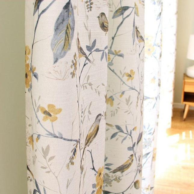 Gardin i hørlook med fugle