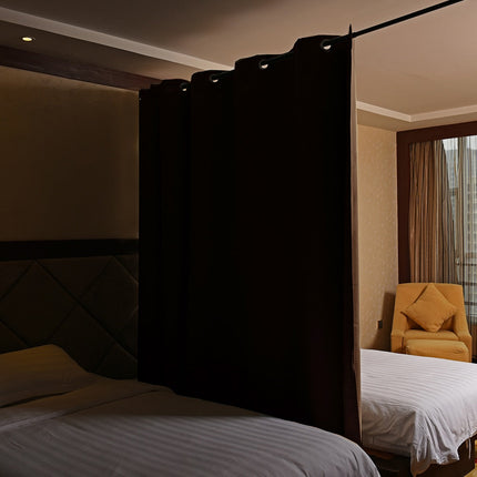 Mørklægningsgardin som praktisk rumdeler