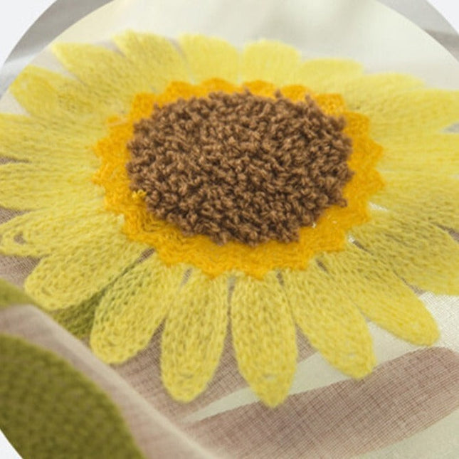 Let gardin broderet med solsikker