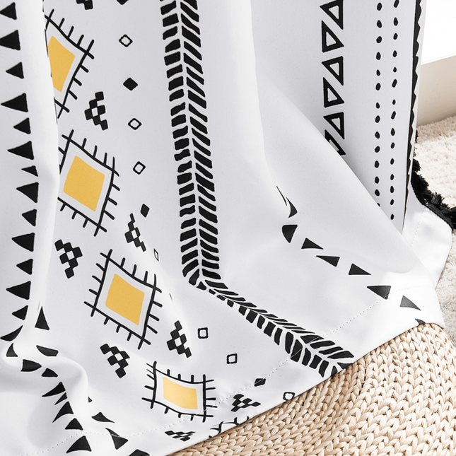 Etnisk boho gardin med kvaster