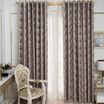 Terracotta mørklægningsgardin med abstrakt mønster