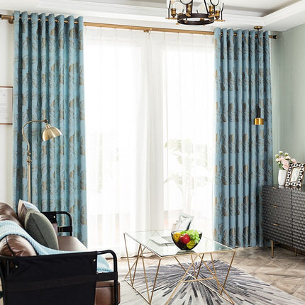 Elegant gardin med gyldent grenmønster