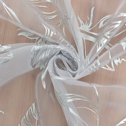 Let gardin med gyldne fjer