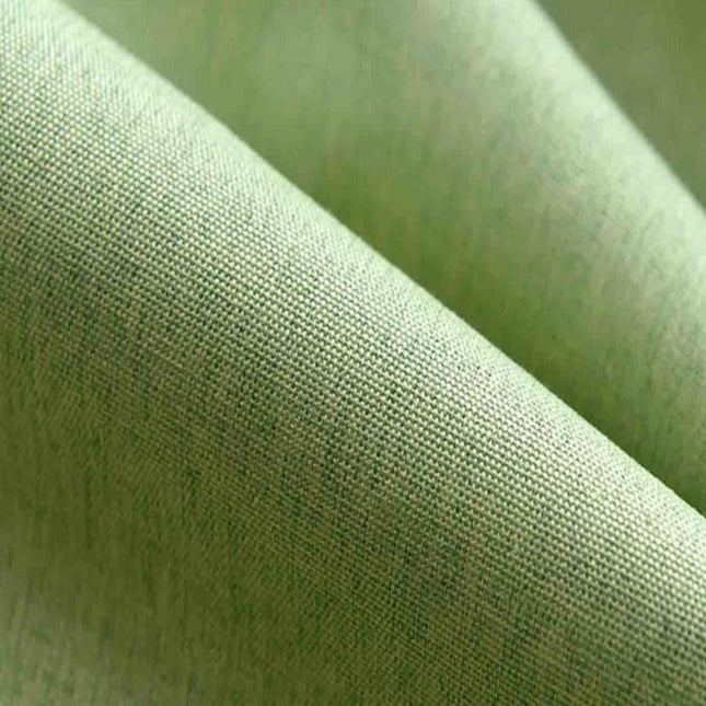 Grønt mørklægningsgardin med struktur til stue