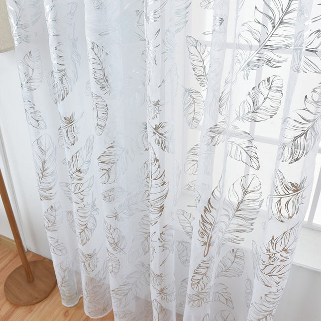 Let gardin med gyldne fjer