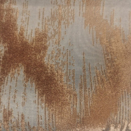 Terracotta mørklægningsgardin med abstrakt mønster