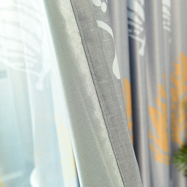 Mørklægningsgardin med gyldent bladmotiv