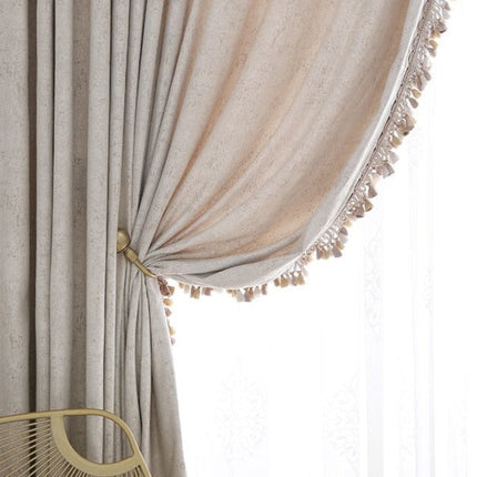 Naturligt boho gardin med kvaster