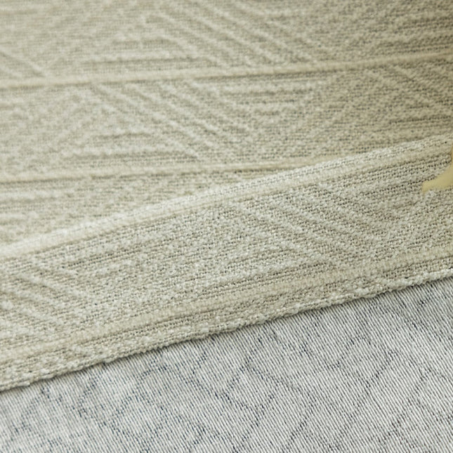 Beige mørklægningsgardin med sildebensmønster