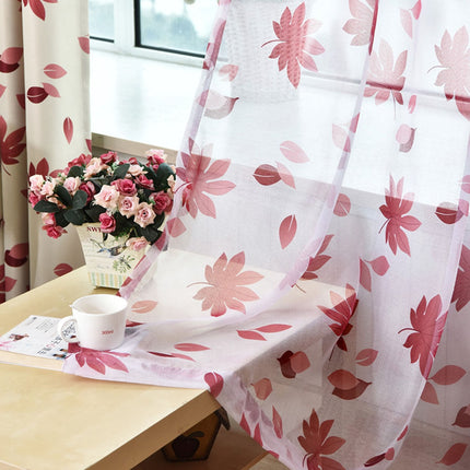 Let gardin med røde ahornblade