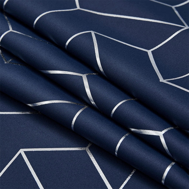 Mørkeblåt mørklægningsgardin med guldmønster