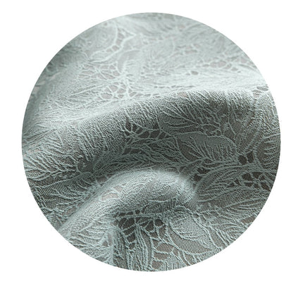 Pistaciegrønt mørklægningsgardin med jacquard mønster