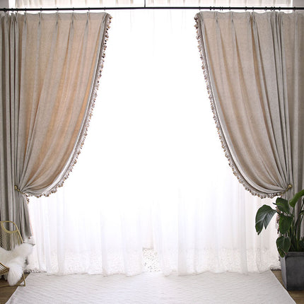 Naturligt boho gardin med kvaster