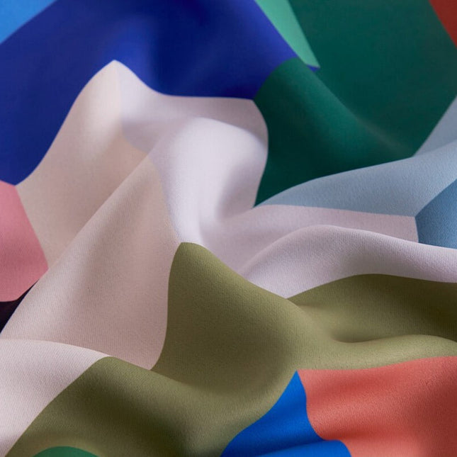 Farverigt udendørs gardin med geometrisk mønster