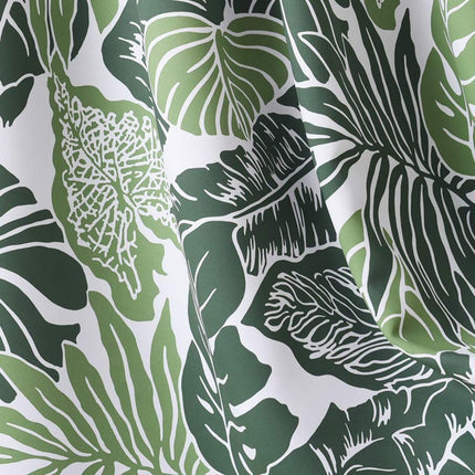 Kort køkkengardin med tropisk bladmotiv