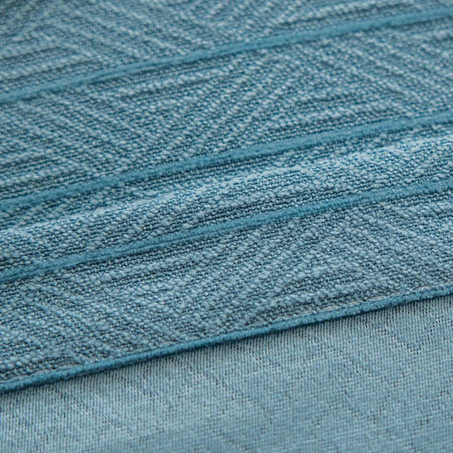 Blåt mørklægningsgardin med vævet tekstur