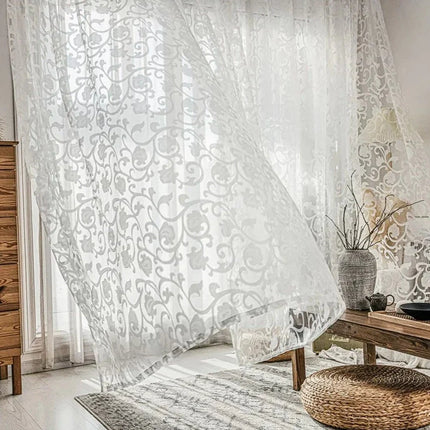 Let gardin med blomsterbroderi