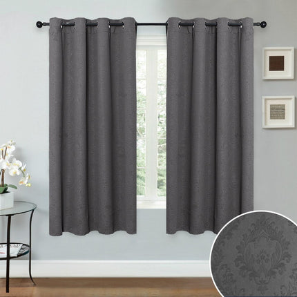 Beige mørklægningsgardin med præget mønster