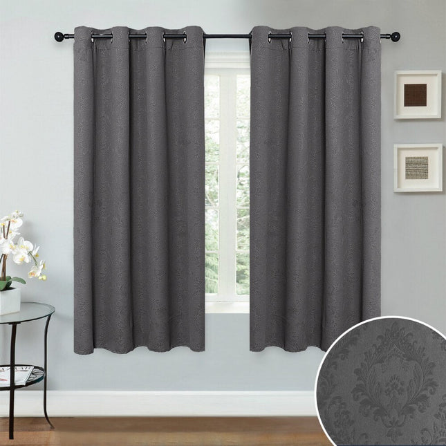 Beige mørklægningsgardin med præget mønster