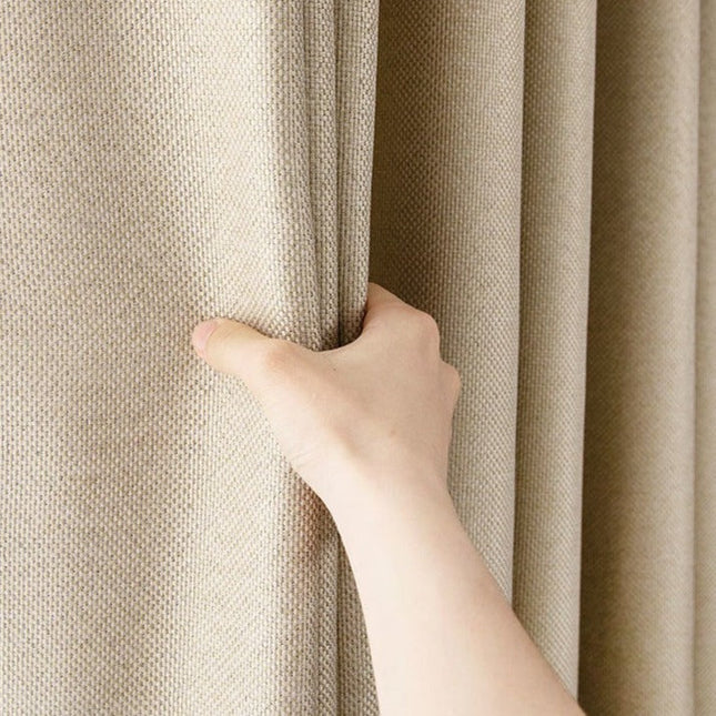 Beige mørklægningsgardin i vævet hørlook