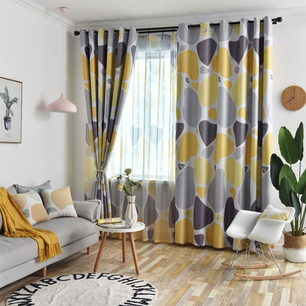 Mørklægningsgardin med abstrakt gul-grå mønster