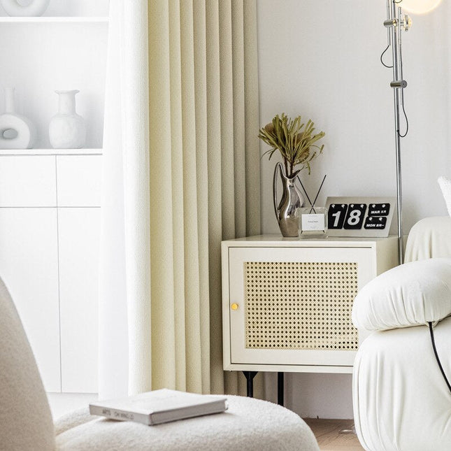 Beige mørklægningsgardin med sildebensmønster