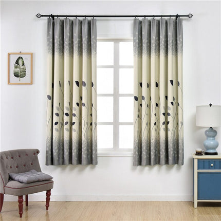 Moderne gardin med elegant bladmotiv