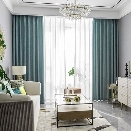 Blåt mørklægningsgardin med bølgemønster