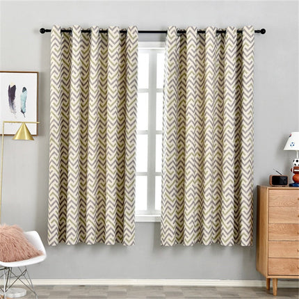 Gardin med gult og gråt chevronmønster