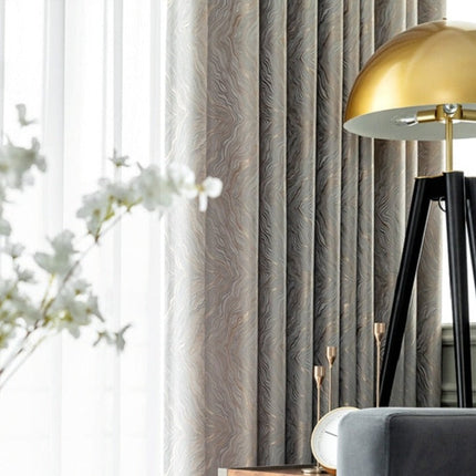 Sølv mørklægningsgardin med elegant mønster