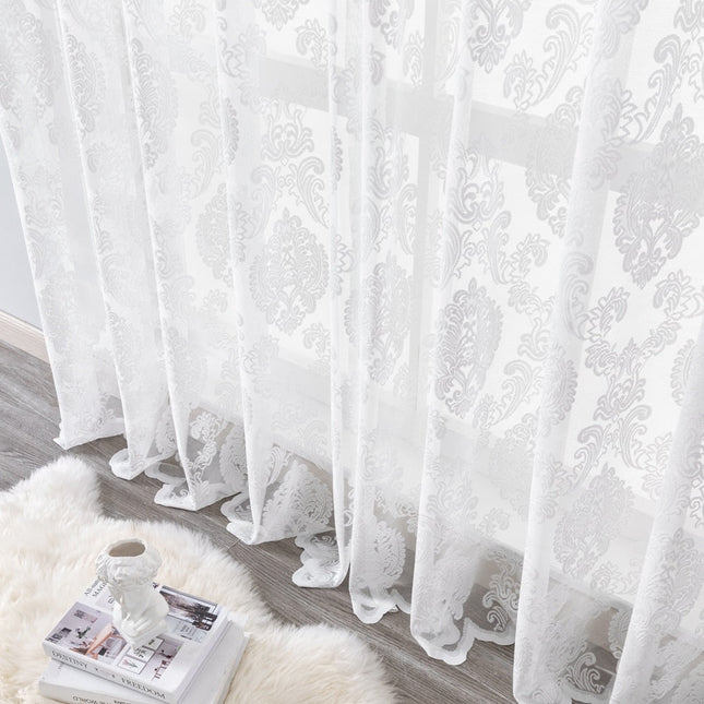 Gennemsigtigt gardin med damask mønster