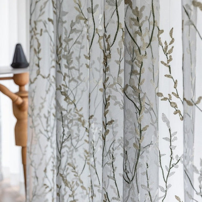 Let gardin med broderede grene