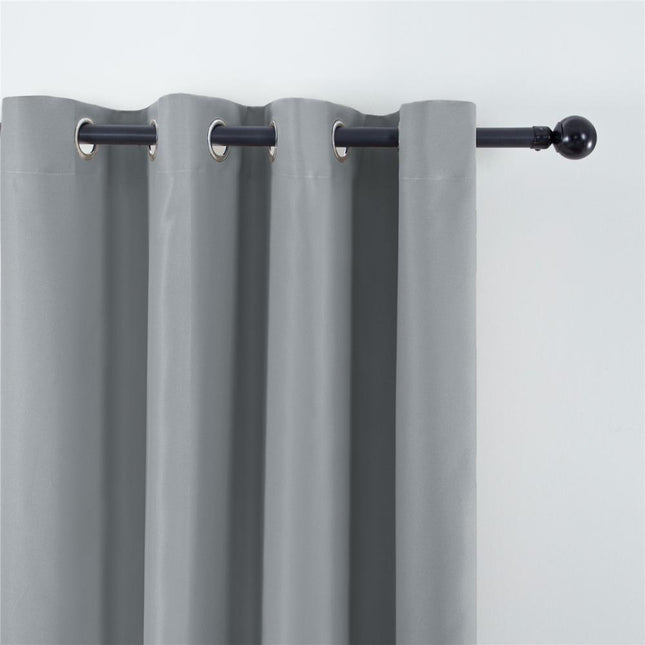 Ensfarvet gråt mørklægningsgardin med øjer