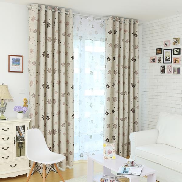 Mørklægningsgardin med simpelt blomstermønster