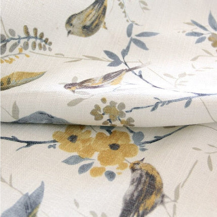 Gardin i hørlook med fugle