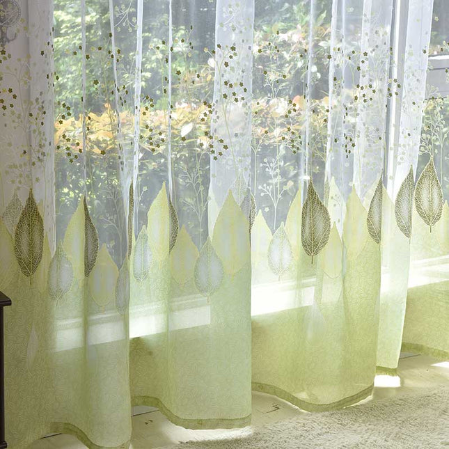 Gennemsigtigt gardin med grønt bladmønster