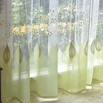 Gennemsigtigt gardin med grønt bladmønster
