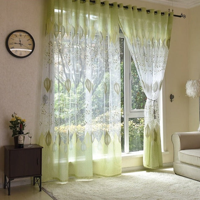 Gennemsigtigt gardin med grønt bladmønster