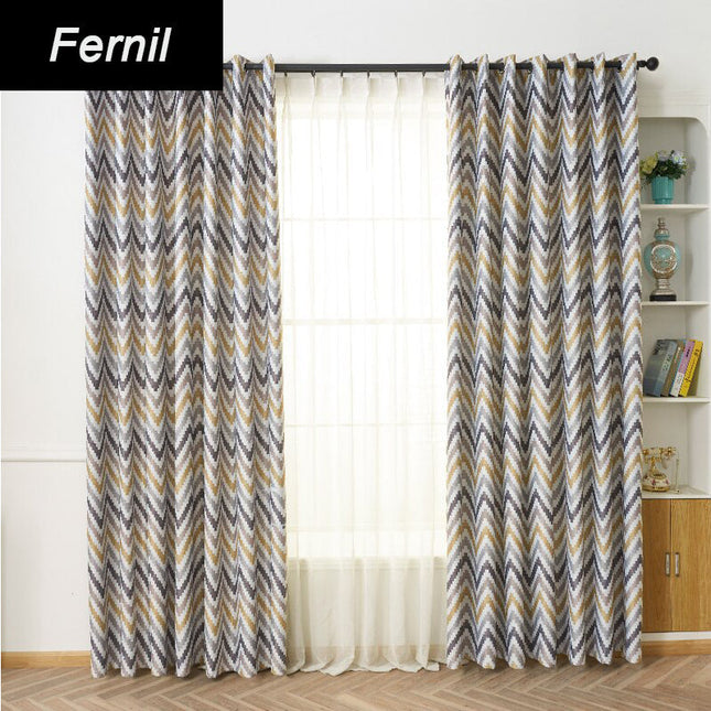 Okkerfarvet Fernil mørklægningsgardin med mønster