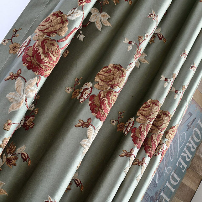 Elegant mørklægningsgardin med blomstermotiv