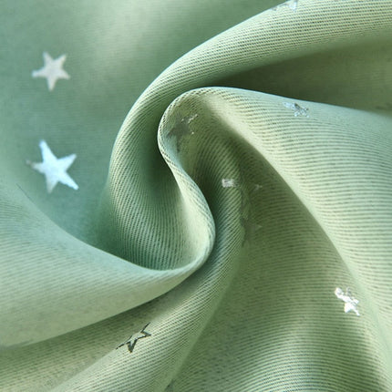 Grønt mørklægningsgardin med stjerner