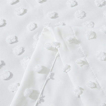 Hvidt let gardin med prikket tekstur