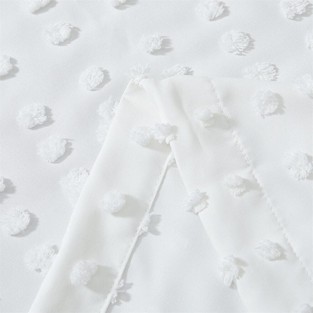 Hvidt let gardin med prikket tekstur