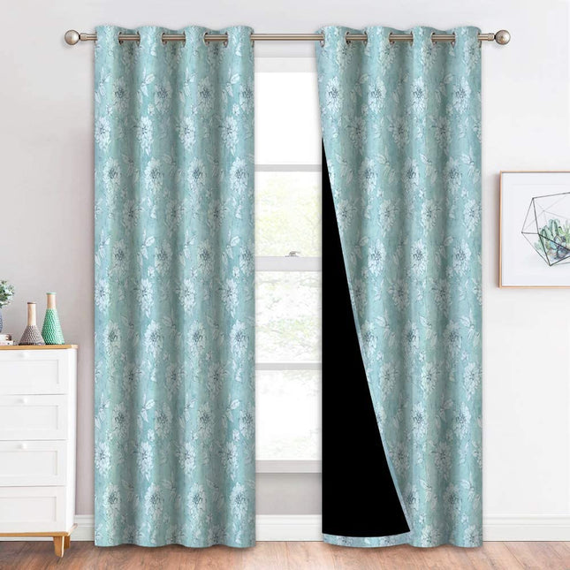 Mørklægningsgardin med blåt blomstermotiv