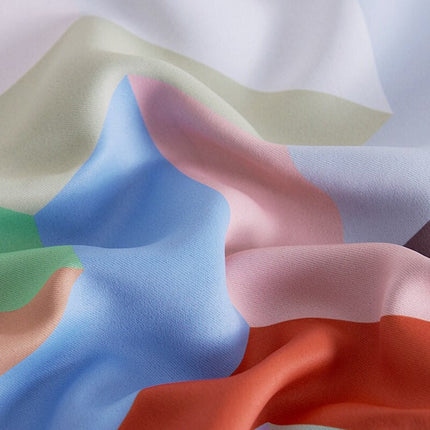 Farverigt udendørs gardin med geometrisk mønster