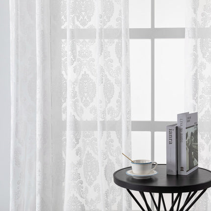 Gennemsigtigt gardin med damask mønster