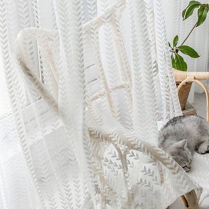 Lysdæmpende gardin med elegant mønster